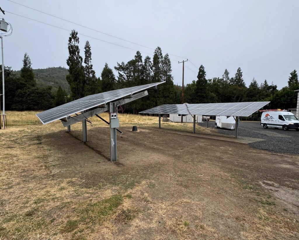 A solar panel array on the side of a road.