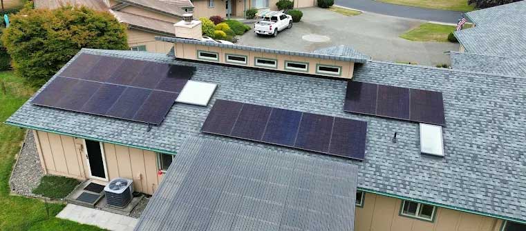 roof-mounted 14.3 kW solar panels